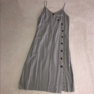 Ana black/white pinstripe below the knee dress.